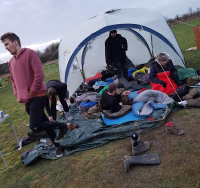 Group of people in a tent